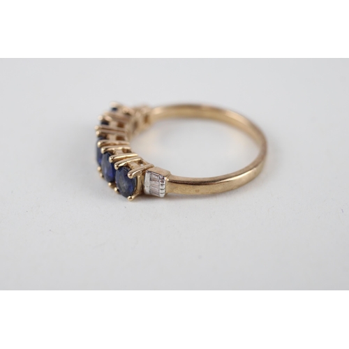 31 - 9ct gold blue gemstone & diamond ring (3g) Size  P