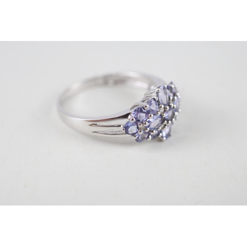 38 - 14ct gold tanzanite & diamond cluster ring (3.1g) Size  R