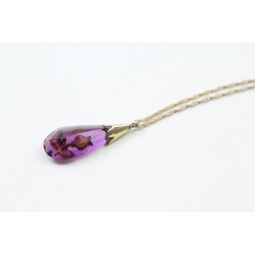 41 - 9ct gold amethyst & seed pearl floral pendant & chain (2.2g)