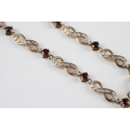 63 - 9ct gold garnet & diamond bracelet (5.8g)