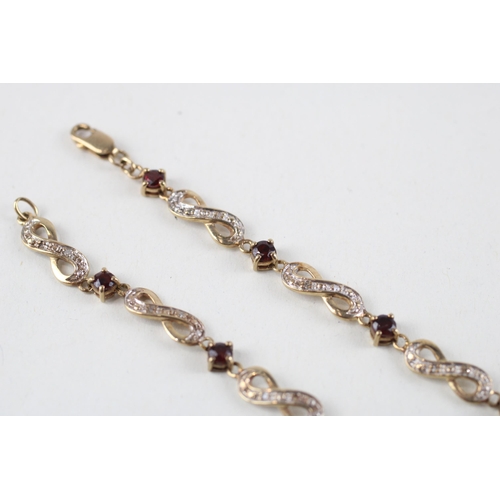 63 - 9ct gold garnet & diamond bracelet (5.8g)