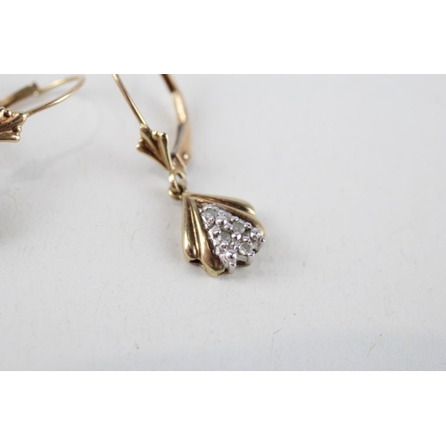 73 - 9ct gold diamond drop pendant (1.9g)