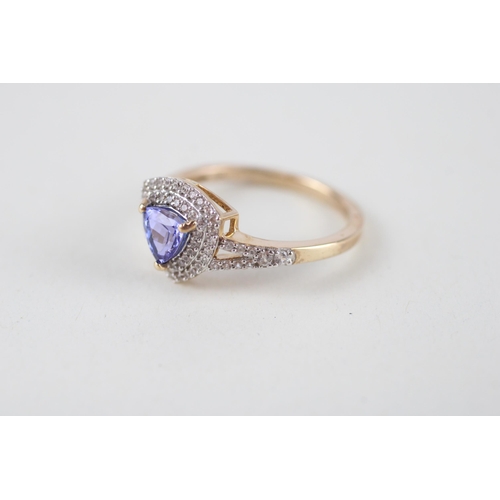 74 - 9ct gold tanzanite & diamond dress ring (3.1g) Size  S