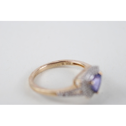 74 - 9ct gold tanzanite & diamond dress ring (3.1g) Size  S