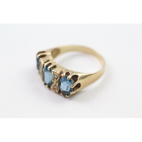 87 - 9ct gold blue gemstone & diamond dress ring (4.3g) Size  P