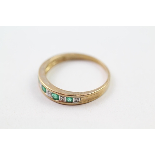 95 - 9ct gold emerald & diamond half eternity ring (2.4g) Size  L