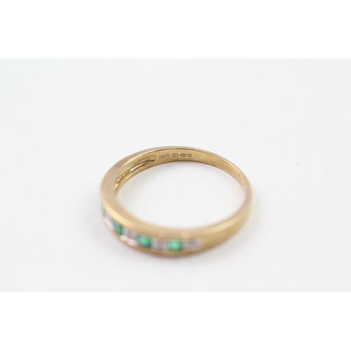 95 - 9ct gold emerald & diamond half eternity ring (2.4g) Size  L