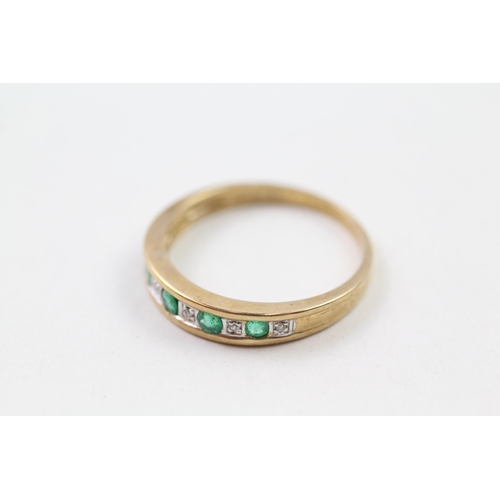 95 - 9ct gold emerald & diamond half eternity ring (2.4g) Size  L