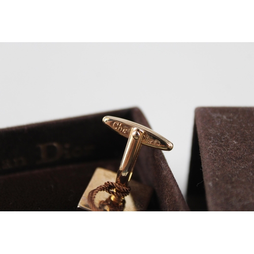 182 - Pair of gold tone cufflinks by designer Christian Dior inc. box (15g)