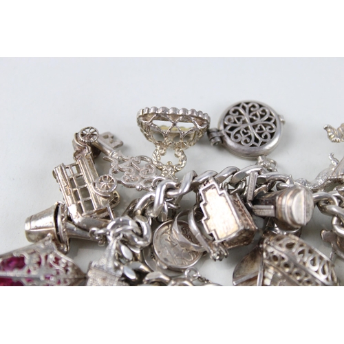 189 - Silver charm bracelet including Disney charm (106g)