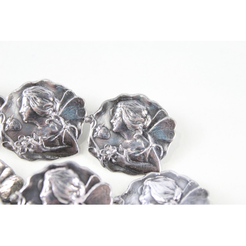 248 - A collection of silver Art Nouveau buttons (26g)