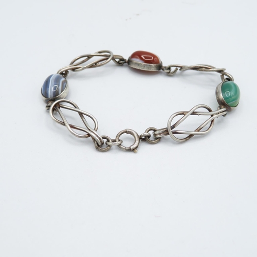 252 - A collection of Scottish silver jewellery including an agate bracelet (35g)