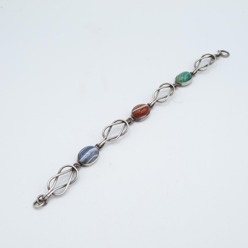 252 - A collection of Scottish silver jewellery including an agate bracelet (35g)