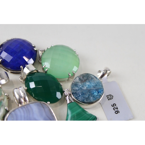 255 - Ten silver mounted gemstone pendants (61g)