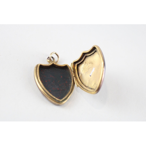 103 - 9ct gold back & front bloodstone patterned locket (5.2g)