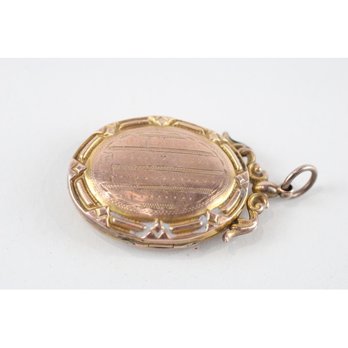 104 - 9ct gold back & front patterned locket (8.5g)