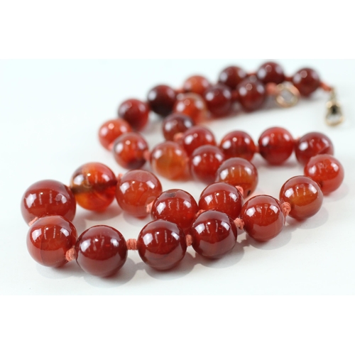 108 - 9ct gold carnelian necklace (79.2g)