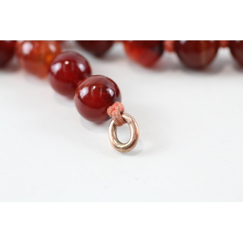 108 - 9ct gold carnelian necklace (79.2g)