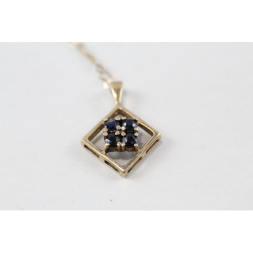 121 - 9ct gold sapphire pendant & chain (1.6g)