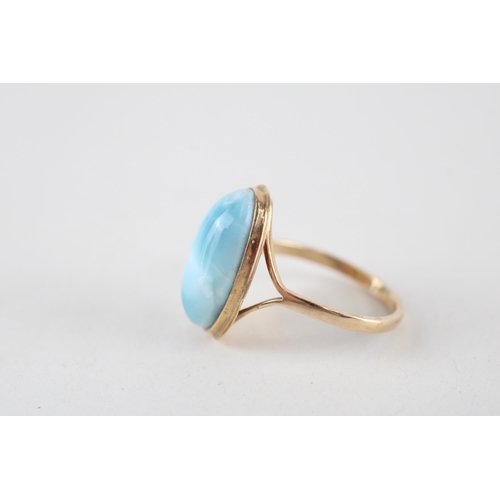 122 - 9ct gold blue gemstone dress ring (3.6g) Size  O