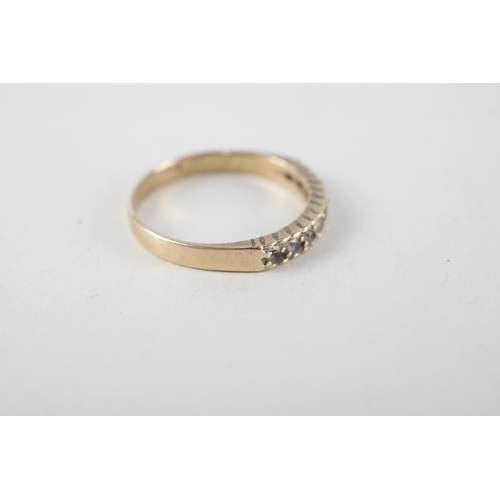 134 - 9ct gold synthetic spinnel half eternity ring (2.2g) Size  R