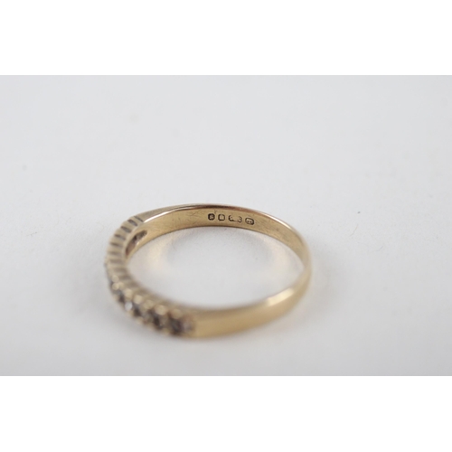 134 - 9ct gold synthetic spinnel half eternity ring (2.2g) Size  R