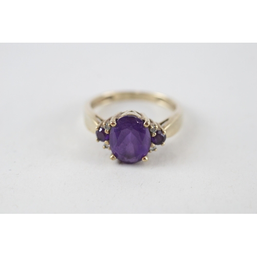 140 - 9ct gold amethyst & diamond dress ring (3g) Size  P