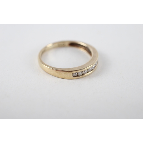 143 - 9ct gold diamond half eternity ring (1.8g) Size  N