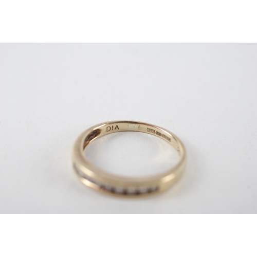 143 - 9ct gold diamond half eternity ring (1.8g) Size  N