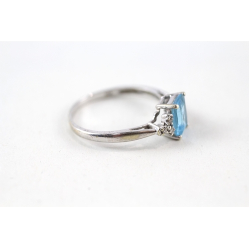 16 - 9ct gold blue topaz & diamond ring (1.8g) Size  Q