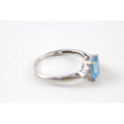 16 - 9ct gold blue topaz & diamond ring (1.8g) Size  Q