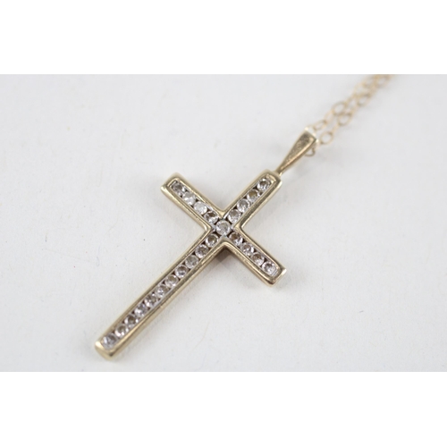 23 - 9ct gold diamond cross pendant & chain (1.5g)