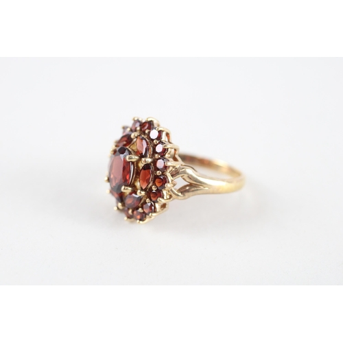 38 - 9ct gold garnet dress ring (4.8g) Size  P