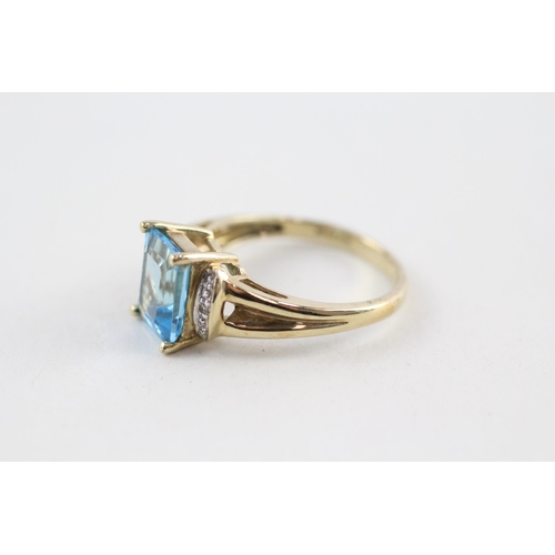 56 - 9ct gold blue topaz & diamond dress ring (2.6g) Size  N