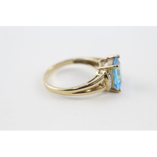 56 - 9ct gold blue topaz & diamond dress ring (2.6g) Size  N