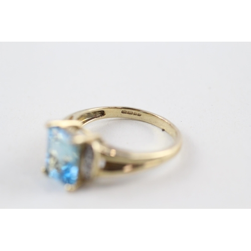 56 - 9ct gold blue topaz & diamond dress ring (2.6g) Size  N