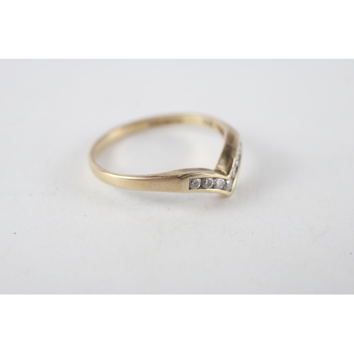 59 - 9ct gold diamond wishbone ring (1.5g) Size  N