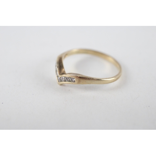 59 - 9ct gold diamond wishbone ring (1.5g) Size  N