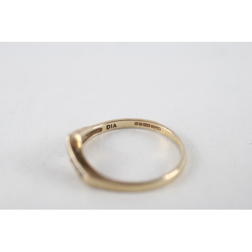 59 - 9ct gold diamond wishbone ring (1.5g) Size  N