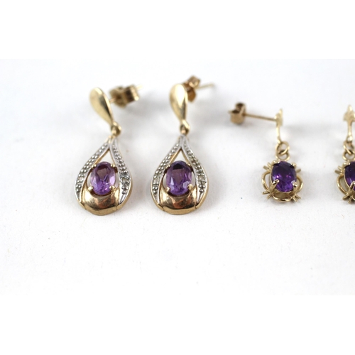 83 - 2x 9ct gold amethyst & diamond drop earrings (3g)