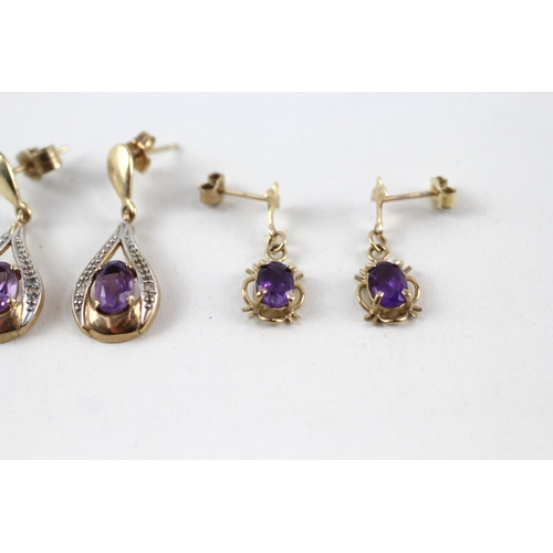 83 - 2x 9ct gold amethyst & diamond drop earrings (3g)