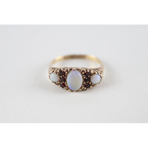 92 - 9ct gold opal & garnet ring (2.9g) Size  K