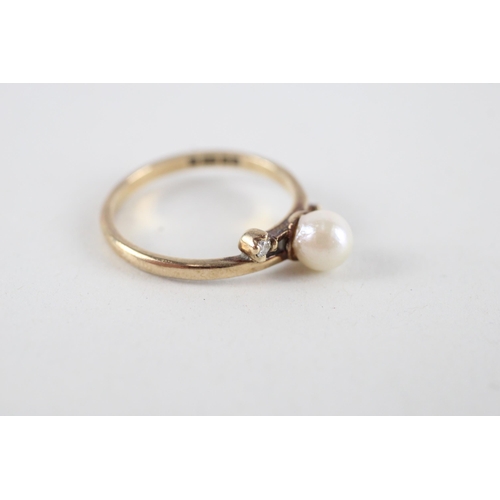 94 - 9ct gold cultured pearl & diamond ring (1.8g) Size  M + M