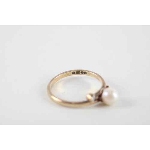 94 - 9ct gold cultured pearl & diamond ring (1.8g) Size  M + M