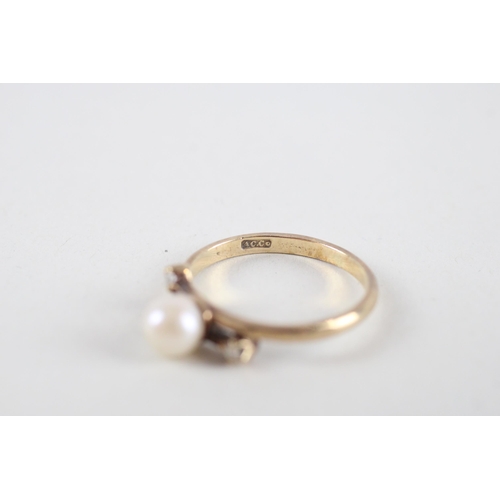 94 - 9ct gold cultured pearl & diamond ring (1.8g) Size  M + M