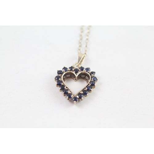 118 - 9ct gold sapphire set open heart pendant necklace (3.1g)