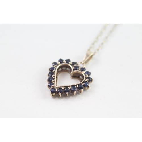 118 - 9ct gold sapphire set open heart pendant necklace (3.1g)