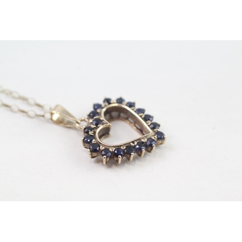 118 - 9ct gold sapphire set open heart pendant necklace (3.1g)