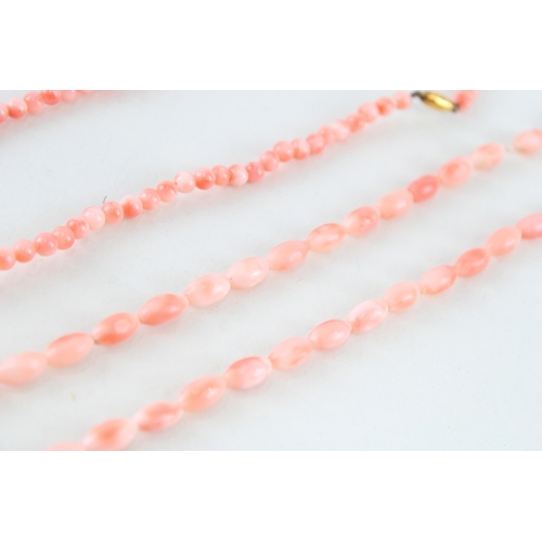 77 - 2 x 9ct gold clasp coral necklaces (24.5g)