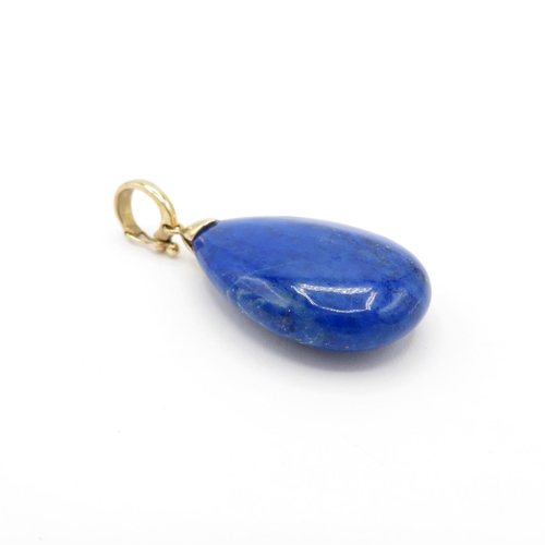 9 - HM 9ct gold blue stone pendant  (10.7g)